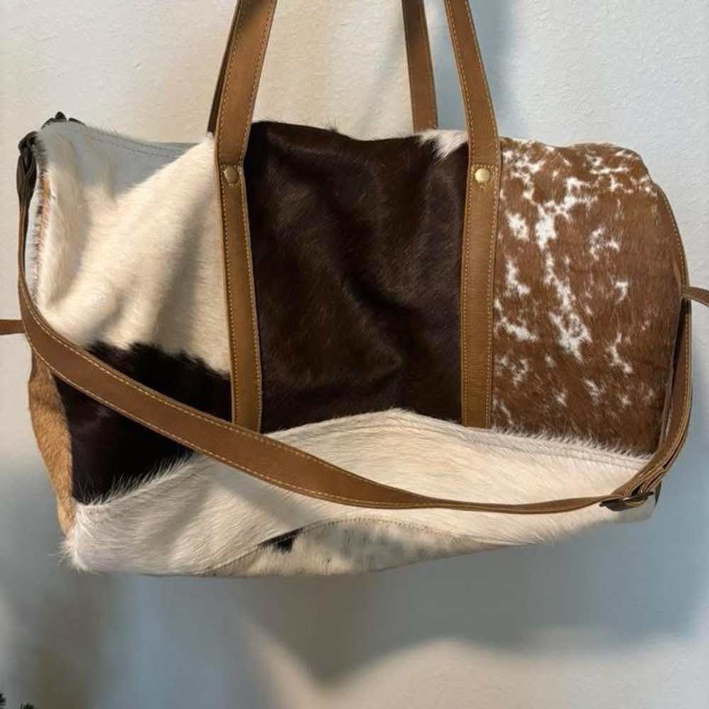 Brown and White Cowhide duffle Bag